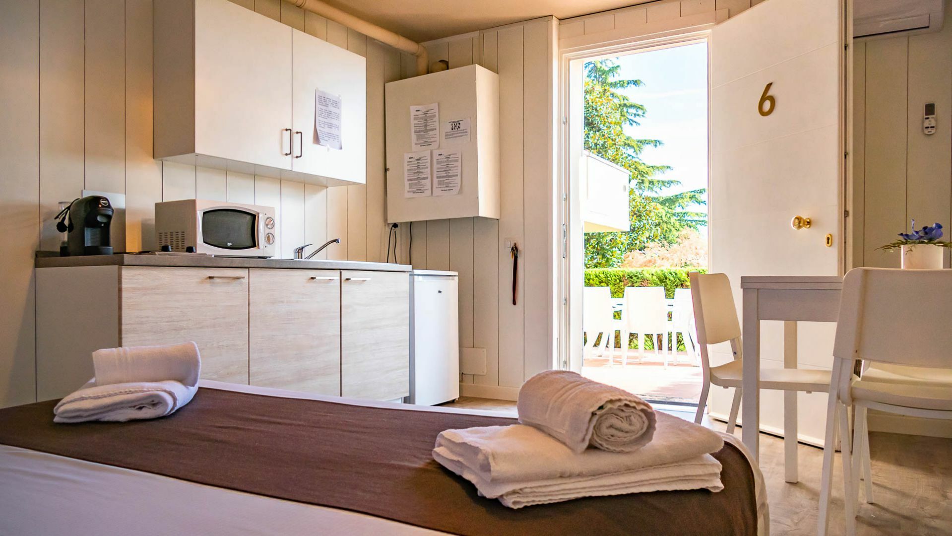 meta title Parkhotel N.D.M. Srl | 2-Bedroom Apartment with Terrace and Garden View